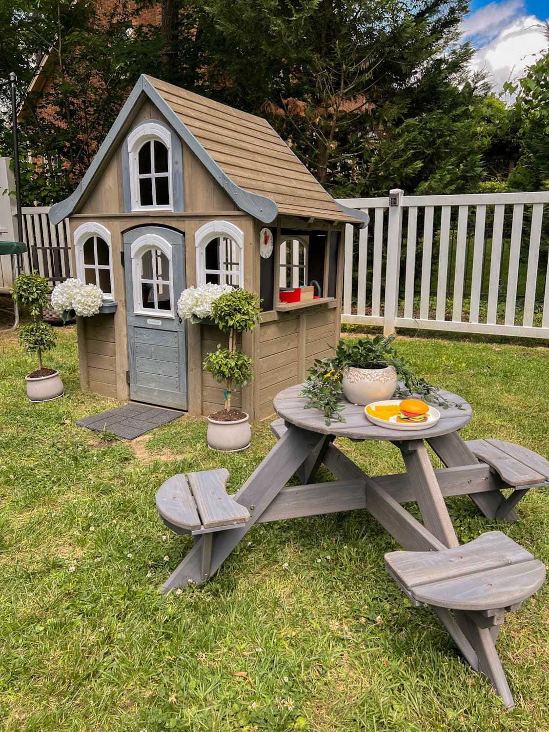 kids outdoor picnic table and playhouse