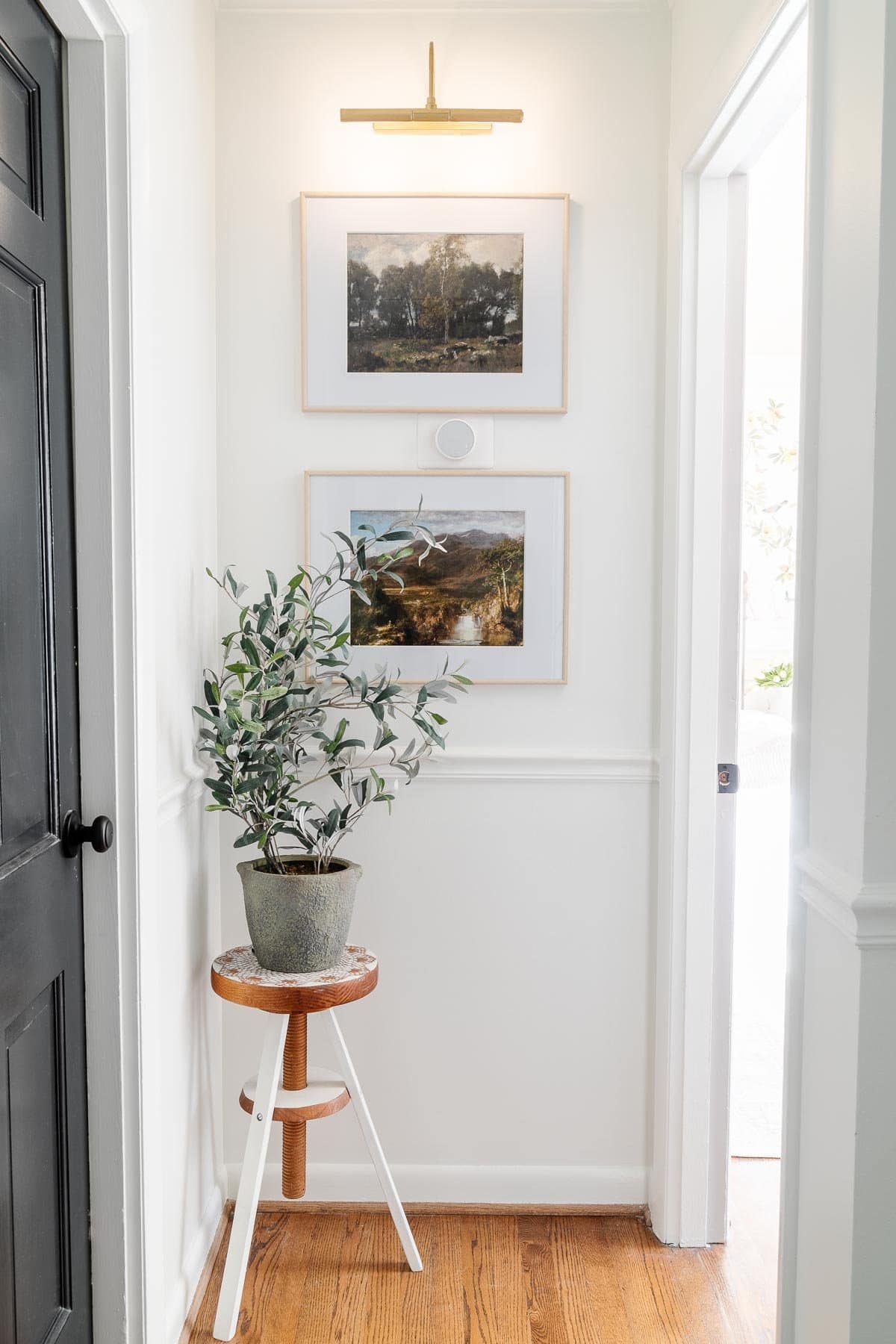 hang art around a thermostat to disguise it on the wall