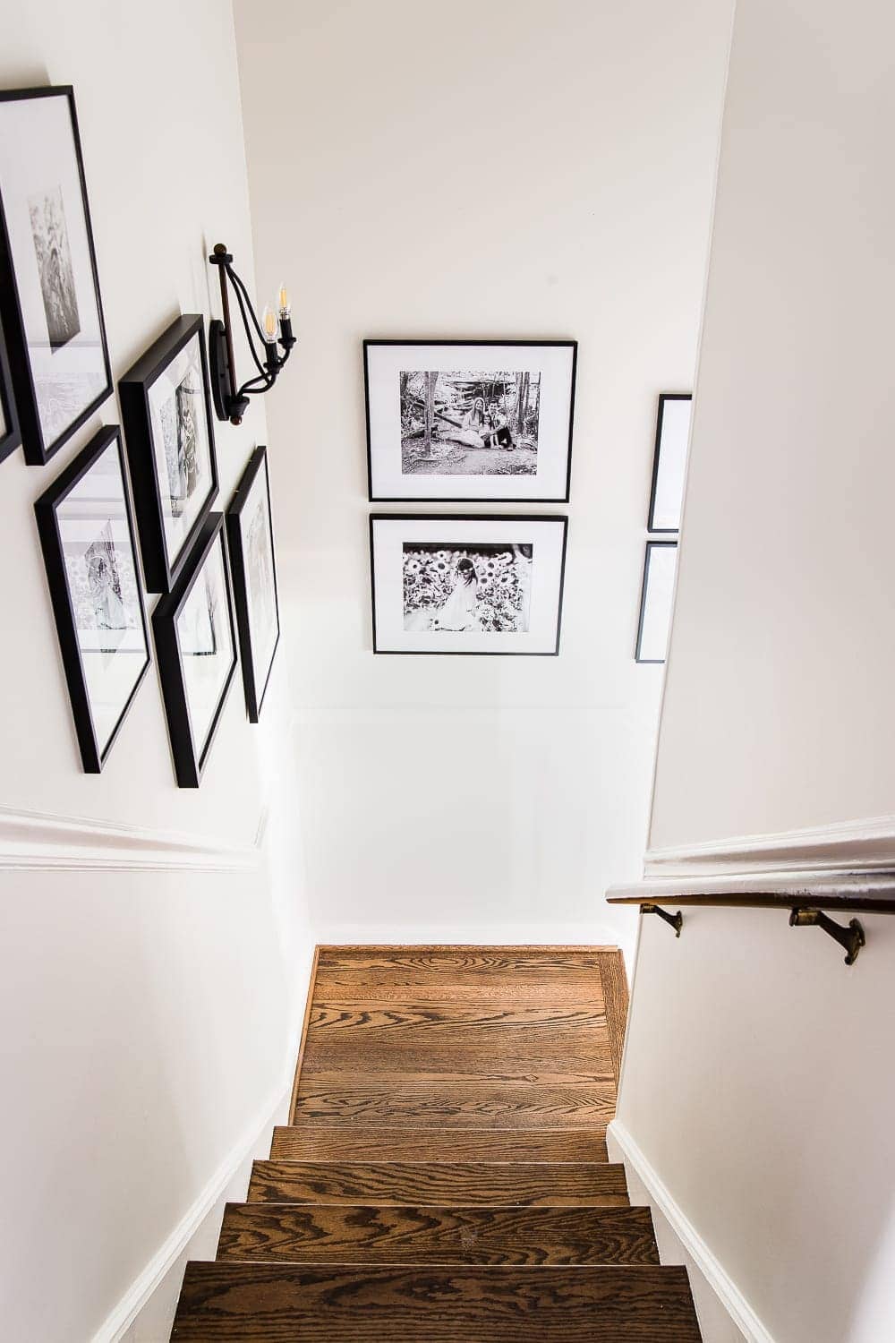 staircase gallery wall with black frames