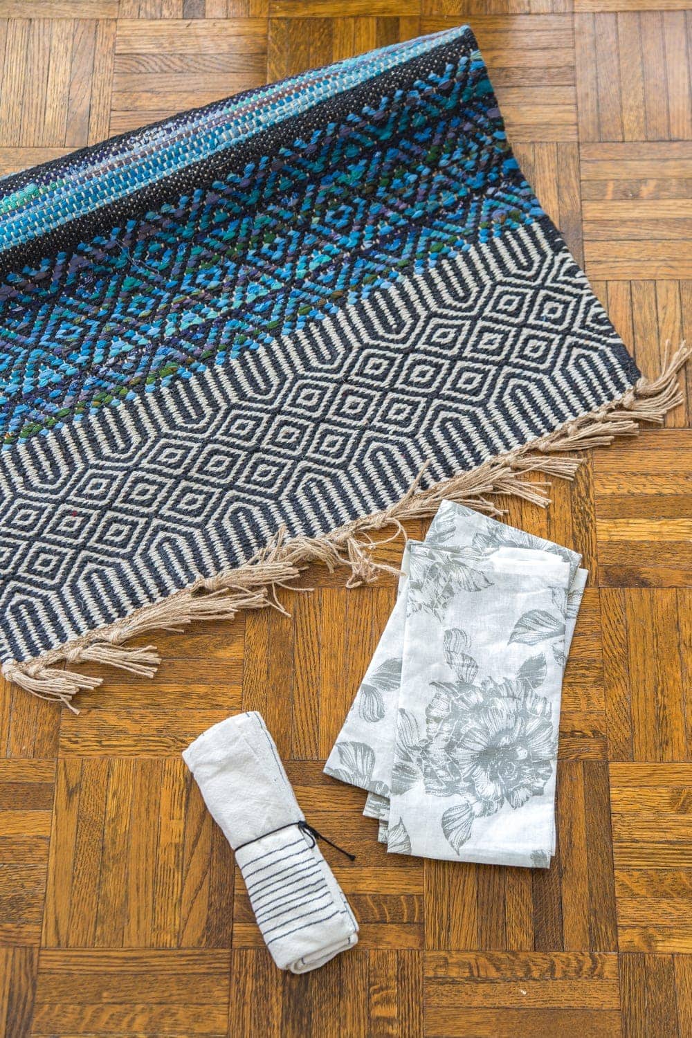 buy rugs, napkins, and tea towels while thrift shopping for repurposed pillows