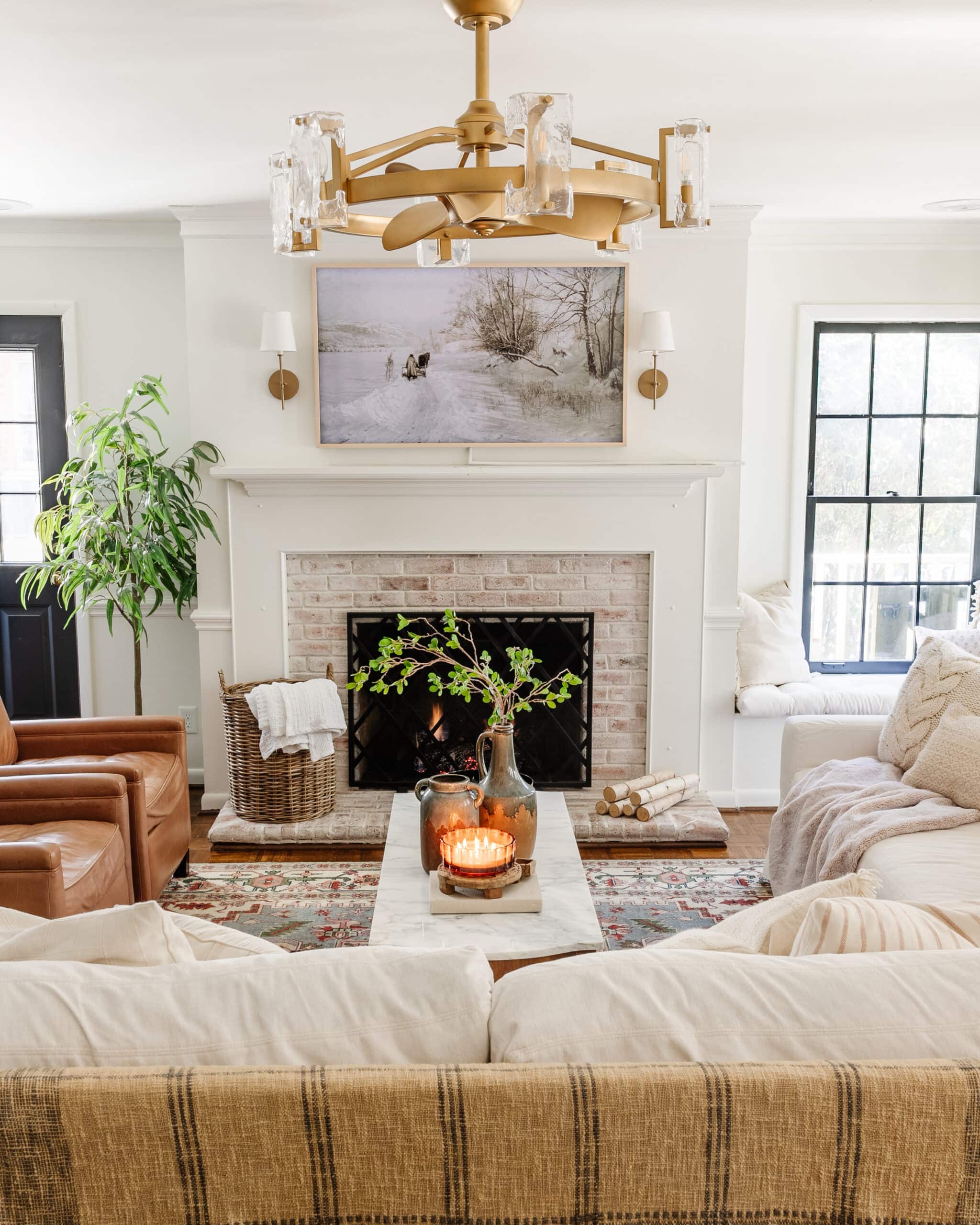 winter decor living room with faux plants and candles