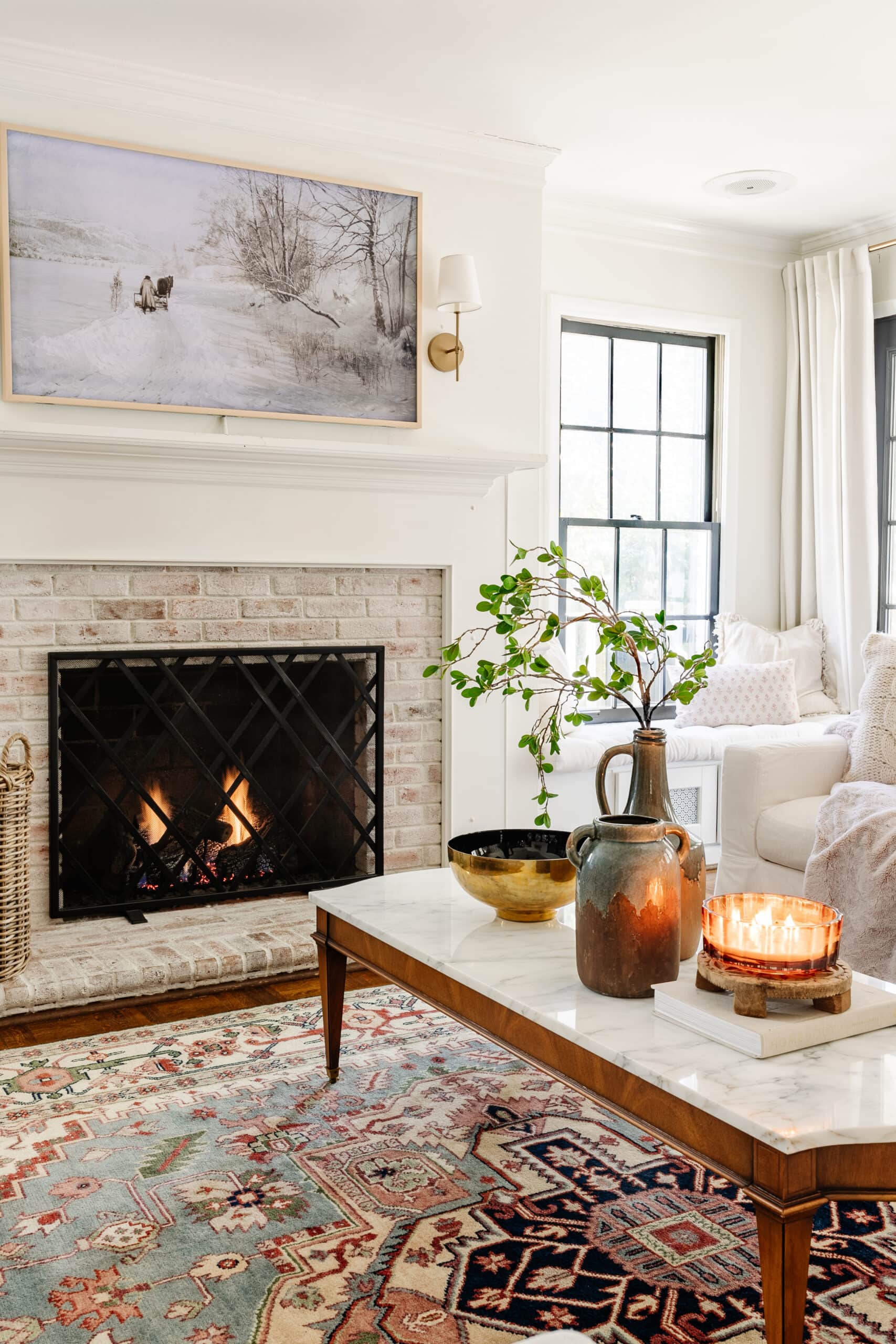 winter fireplace with snow art and limewashed brick