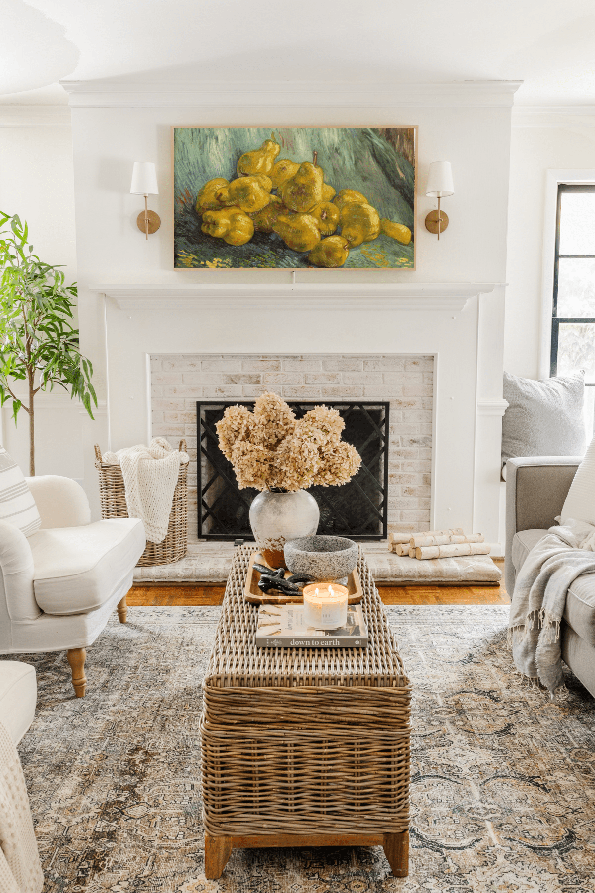 Samsung Frame TV in living room with still life art