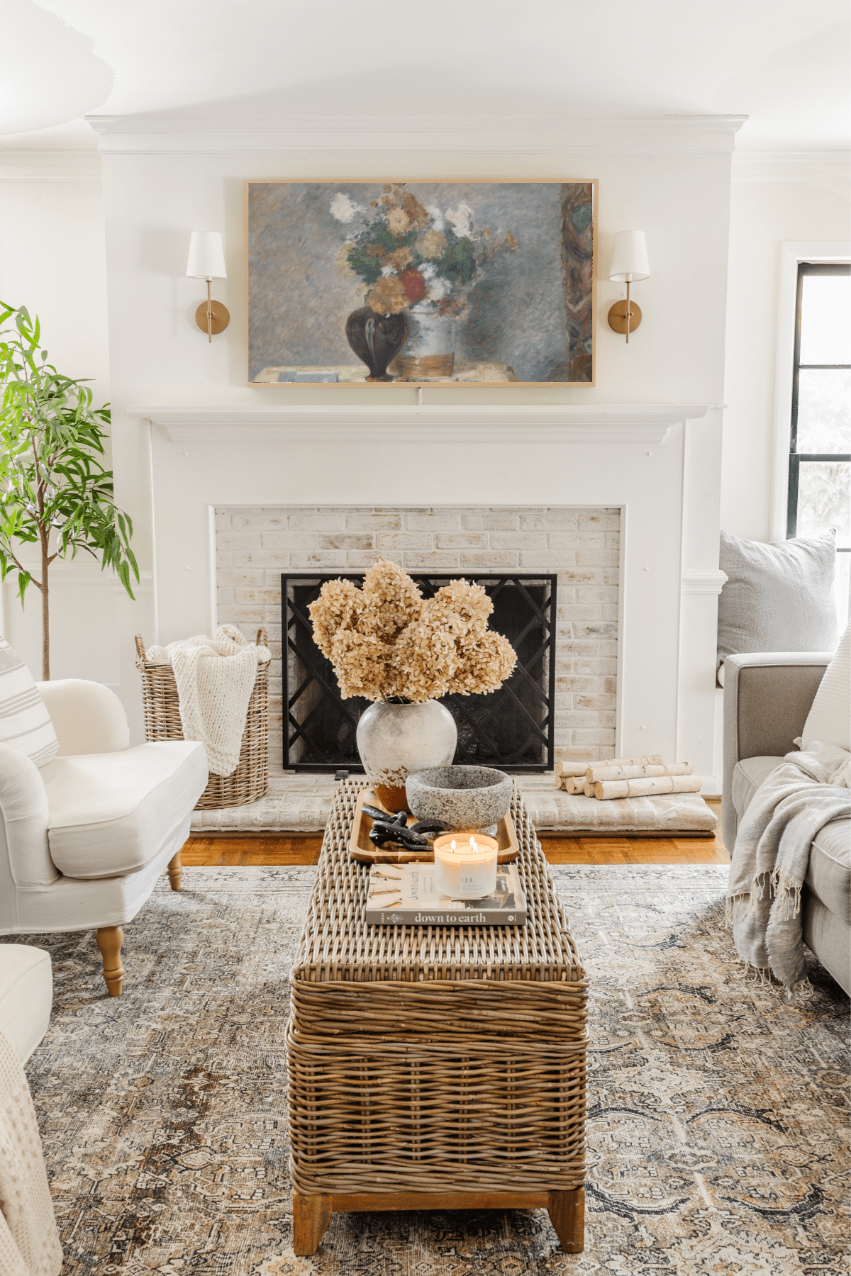 Samsung Frame TV in living room with still life art