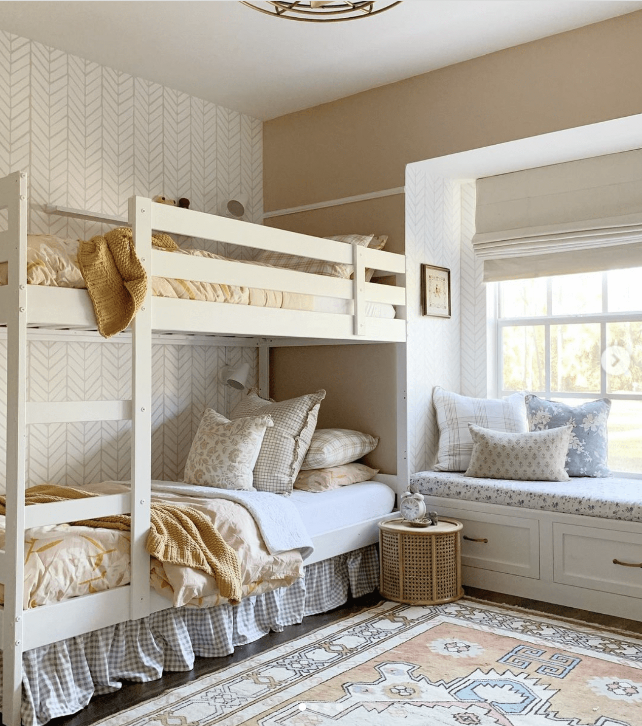 blush pink shared bedroom for girls with eclectic bedding