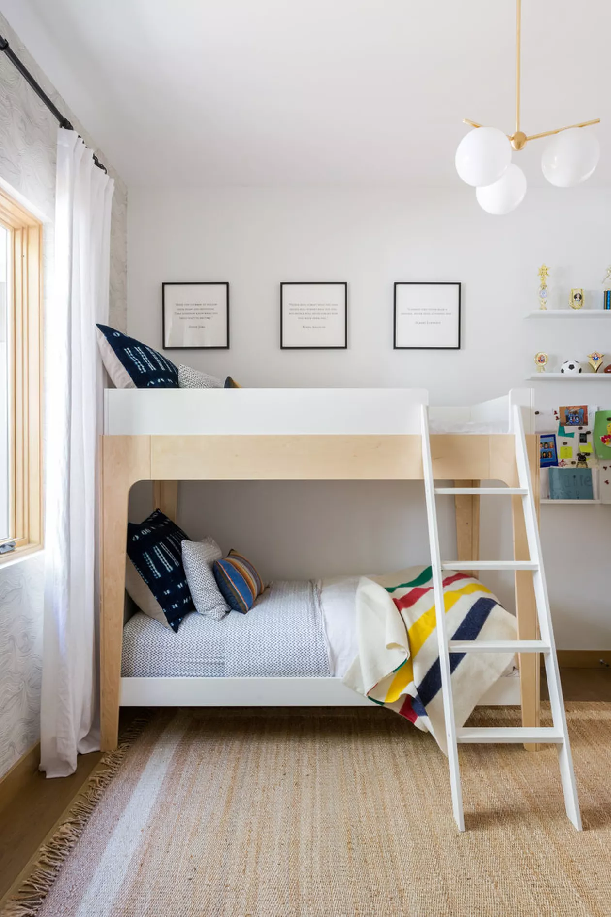 modern bunk beds with clean and simple decor and modern light fixture
